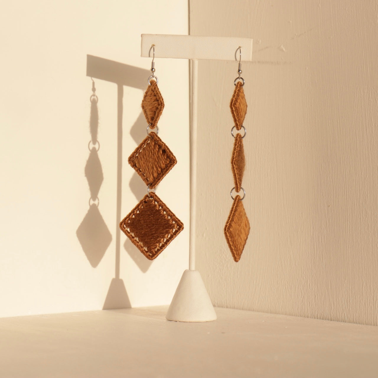 Caramel Kambi earrings, delicately crafted for a perfect balance of structure and organic flow.
