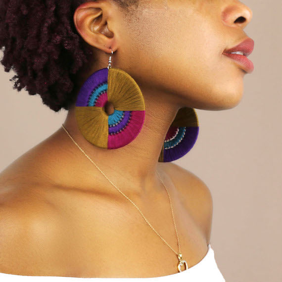 Daryl statement earrings by OlaNti, handcrafted with vibrant geometric design. Made in Houston