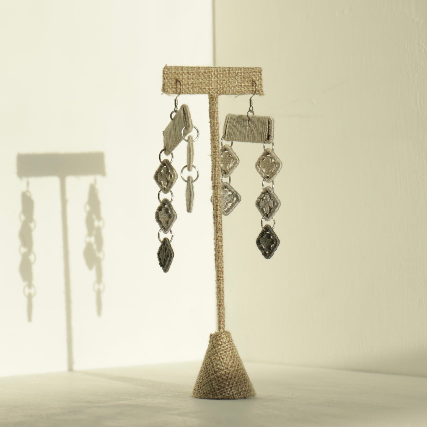 The Finesse earrings in gray by OlaNti, bold yet understated, designed for fluid motion