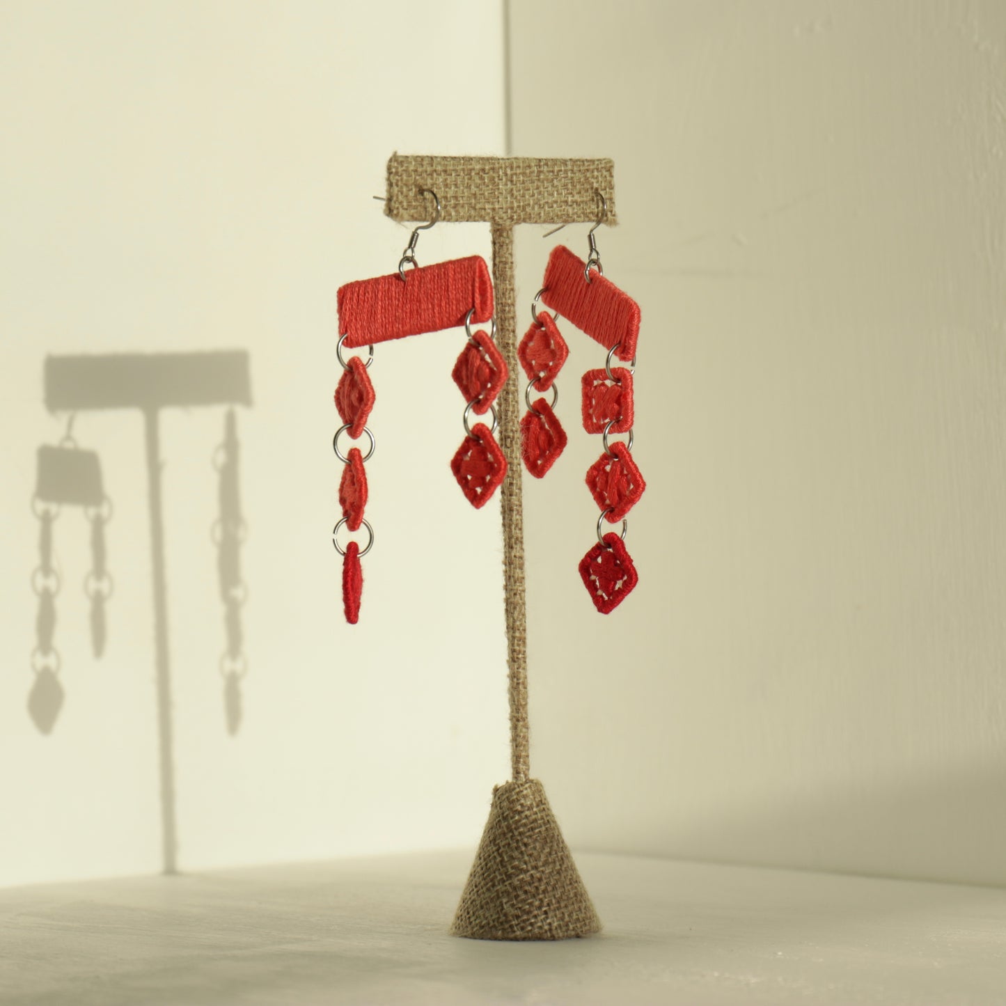 The Finesse earrings in red by OlaNti, an artistic cascade of handcrafted design