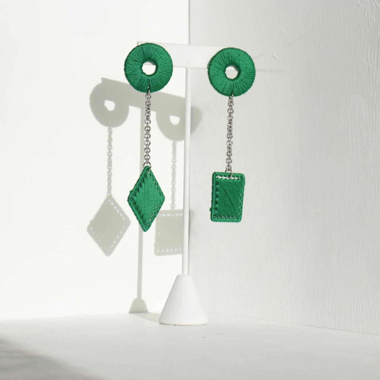 The Klowii earrings in dark green by OlaNti Houston, modern and refined