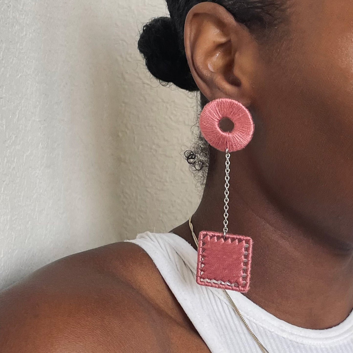 The Klowii earrings in soft light gradient pink by OlaNti Houston, a gentle yet structured look