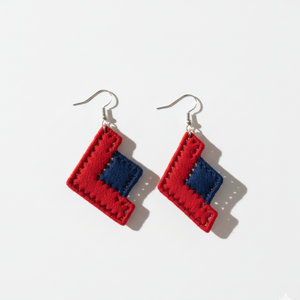 Red and blue geometric earrings on a white background