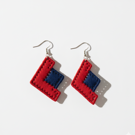 Red and blue geometric earrings on a white background