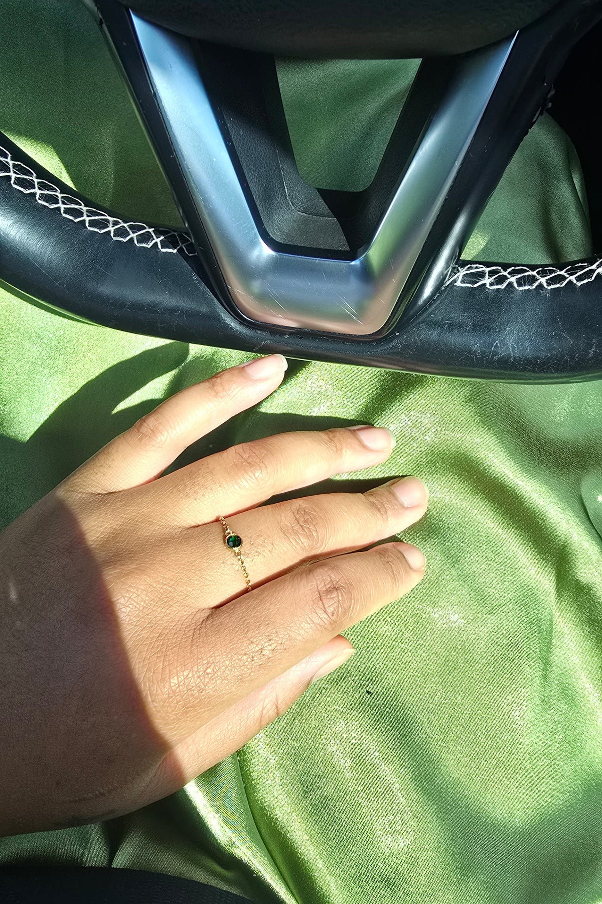 Will an earring hold chain ring with green crystal