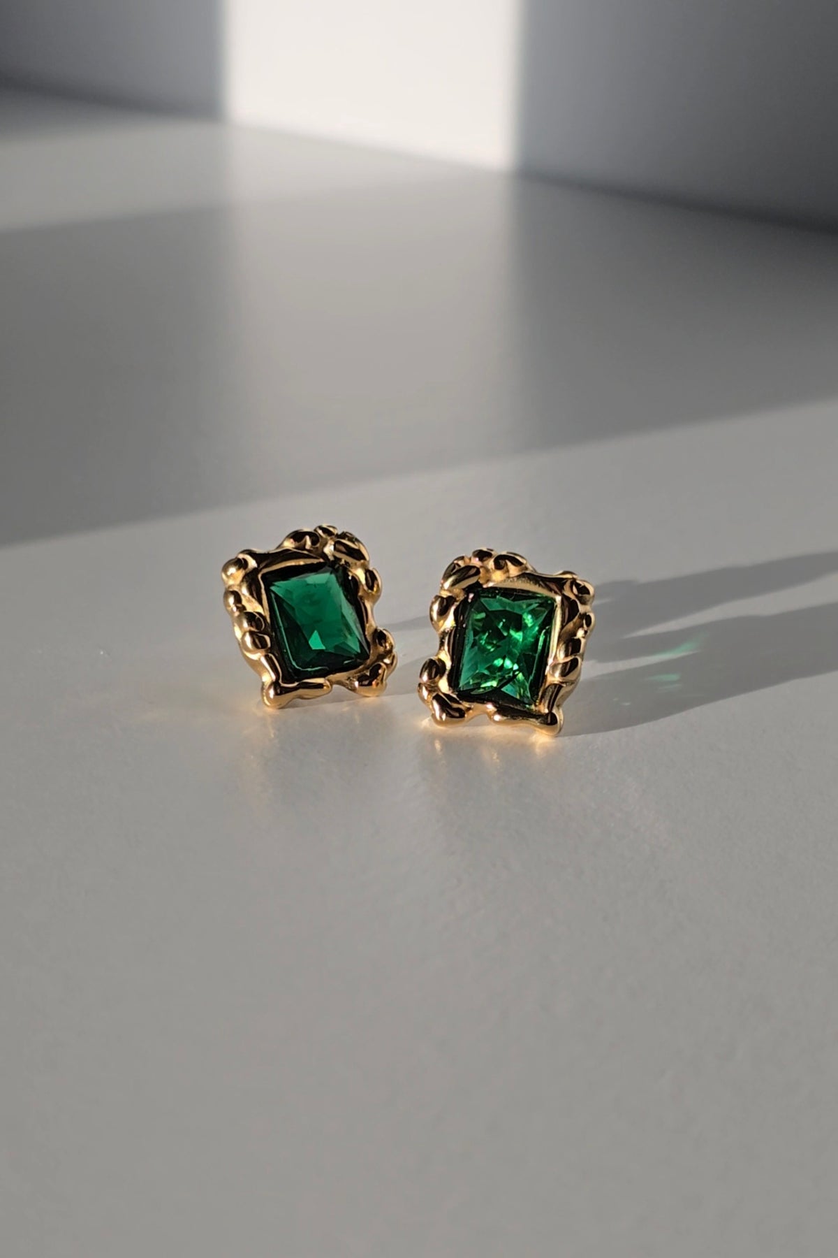 Tobe stud earrings with square green stones