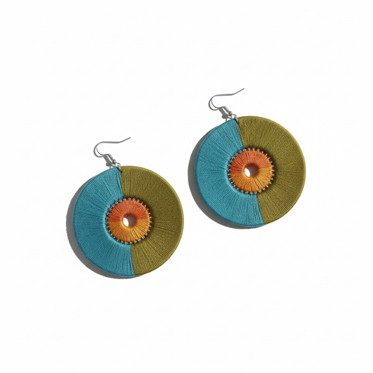 Colorful circular earrings on a white background