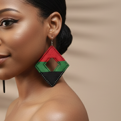 Woman wearing colorful earrings against a beige background