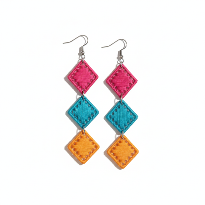 Colorful diamond-shaped earrings on a white background