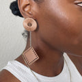 The Klowii earrings in brown by OlaNti Houston, a neutral-toned contemporary design
