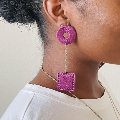The Klowii earrings in deep purple by OlaNti Houston, balancing boldness and minimalism