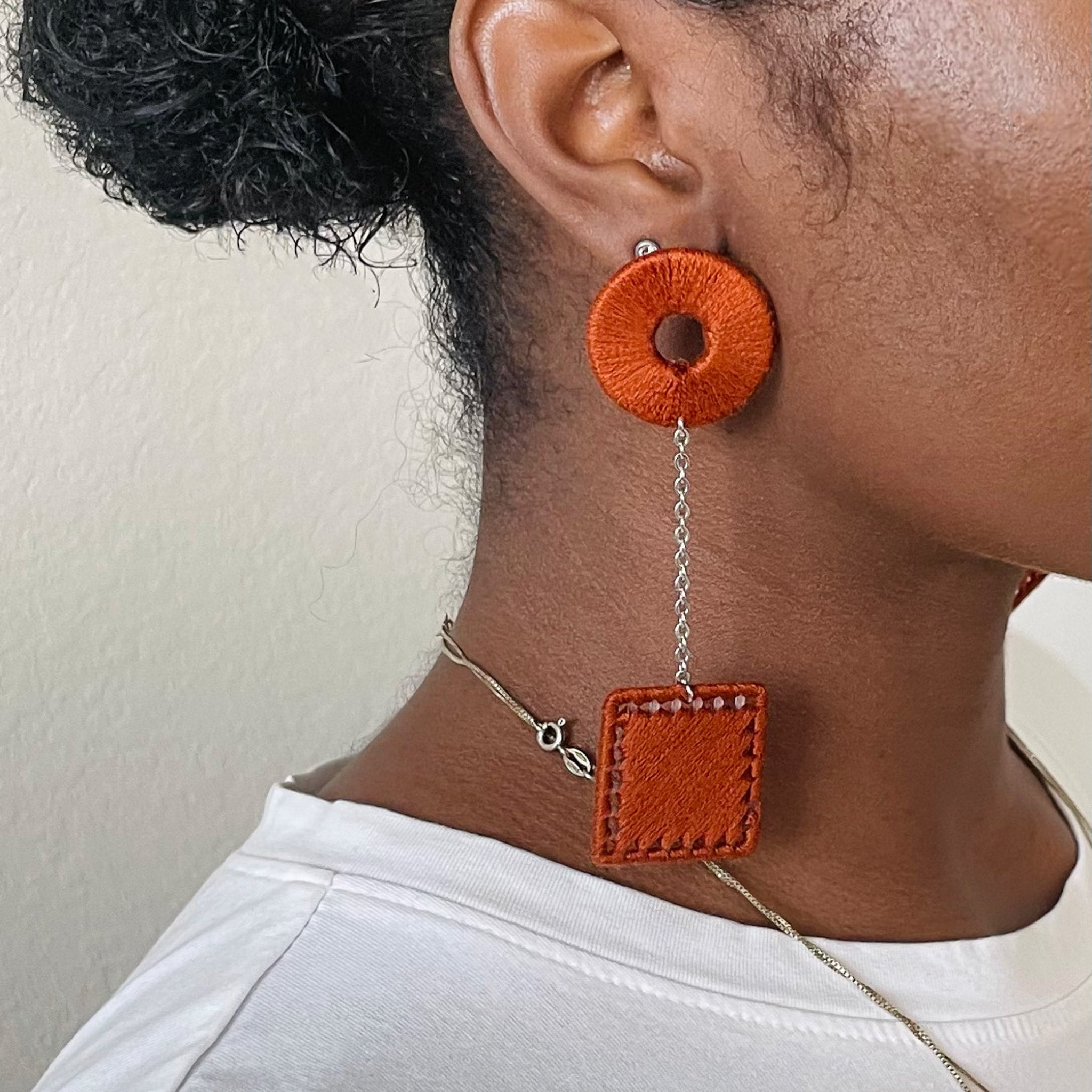 The Klowii earrings in brown by OlaNti Houston, a neutral-toned contemporary design